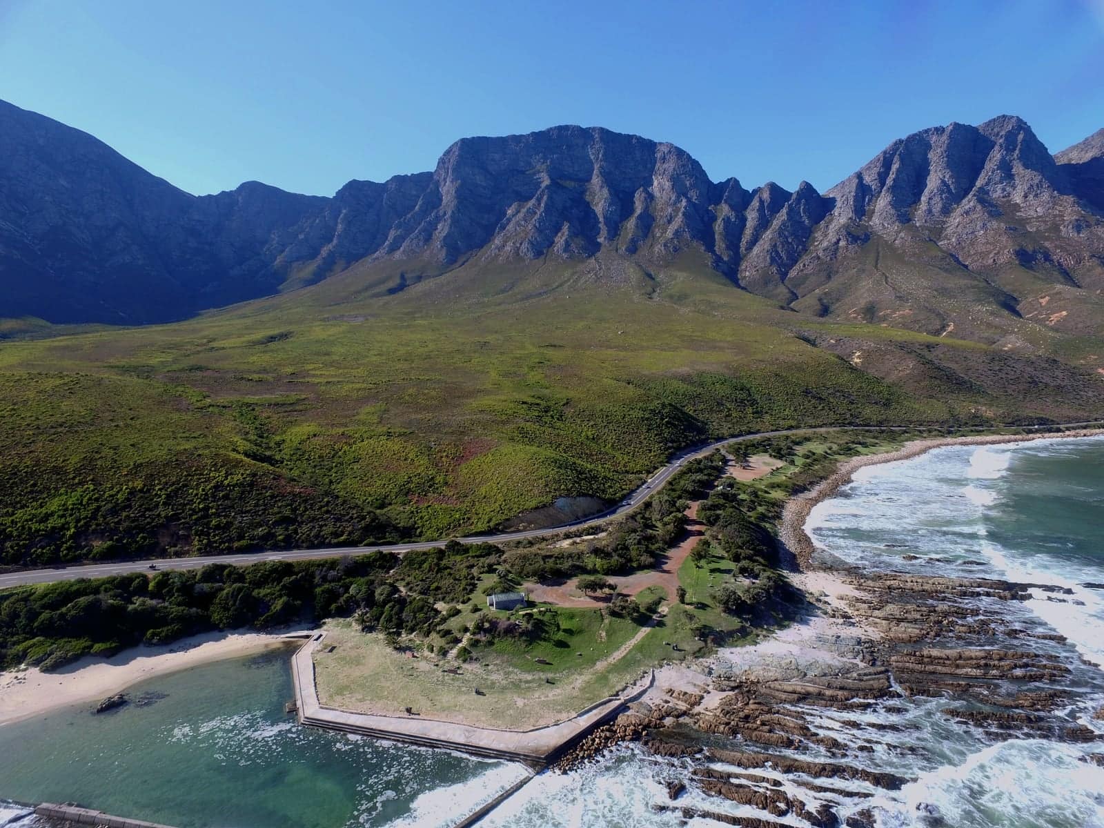 Clarence Drive (R44) winding along the coast below the Kogelberg mountains