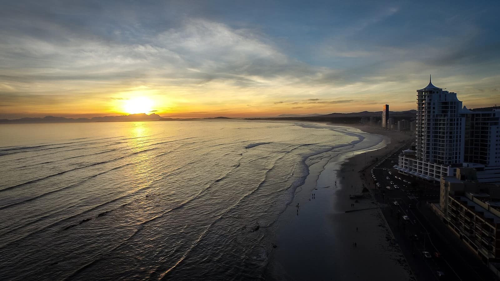 Sunset over Strand Beach and the False Bay coastline